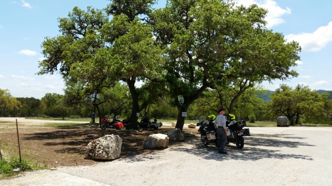 motorcycle-only parking under live oaks