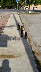 Boots on the motel sidewalk. Oddly, they were gone the next morning...